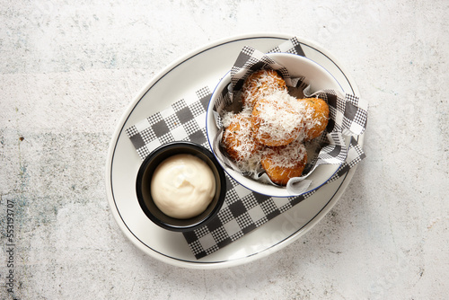 Truffle arancini balls on plate with mayonnaise photo