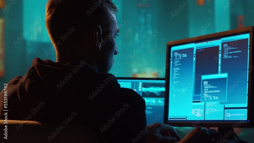 Computer Hacker in Hoodie. Obscured Dark Face. Hacker Attack, Virus Infected Software, Dark Web and Cyber Security concept