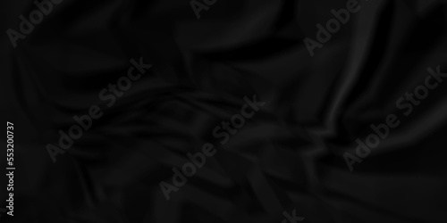 Dark Black facbric paper backdrop crumpled texture. dark black textured crumpled black paper background. panorama black paper texture background, crumpled pattern.