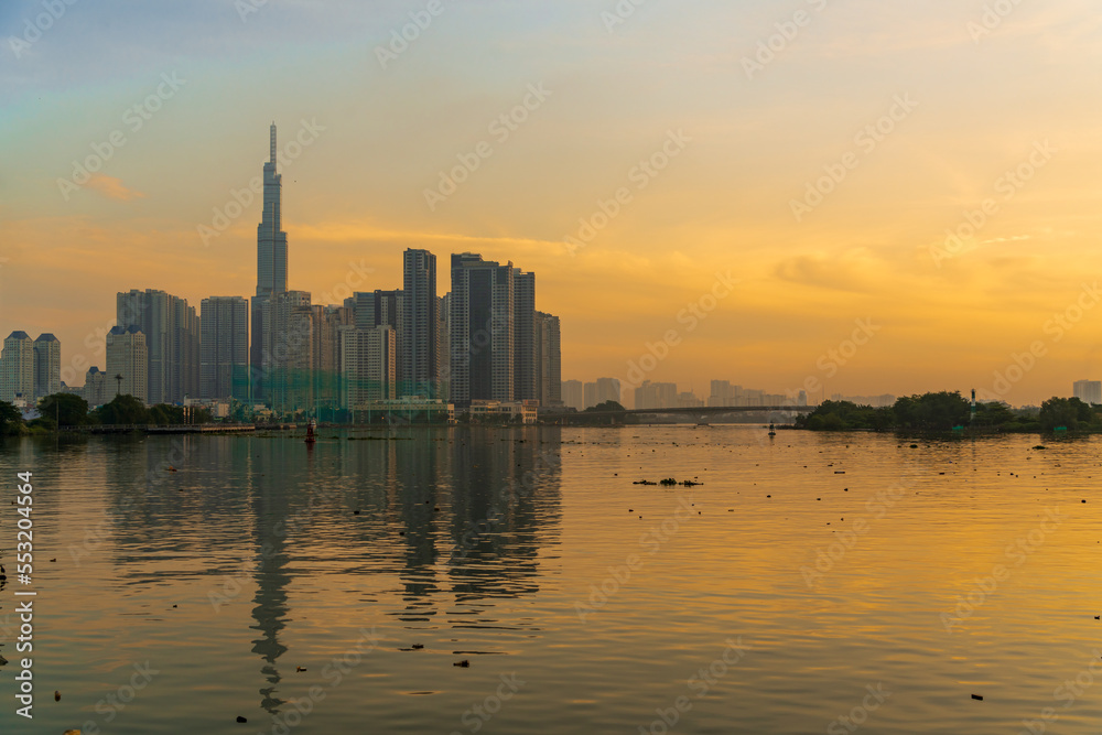 Fototapeta premium Beautiful morning in District 1, view to Landmark 81, the tall skyscraper in Vietnam and all Southeast Asia.