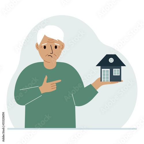 A man holds a small house in his palm. Concepts of inheritance, real estate transfer, mortgage, credit, loan or house purchase.