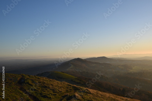 the top of the Malvern hills on a misty day during sunset © JoeE Jackson