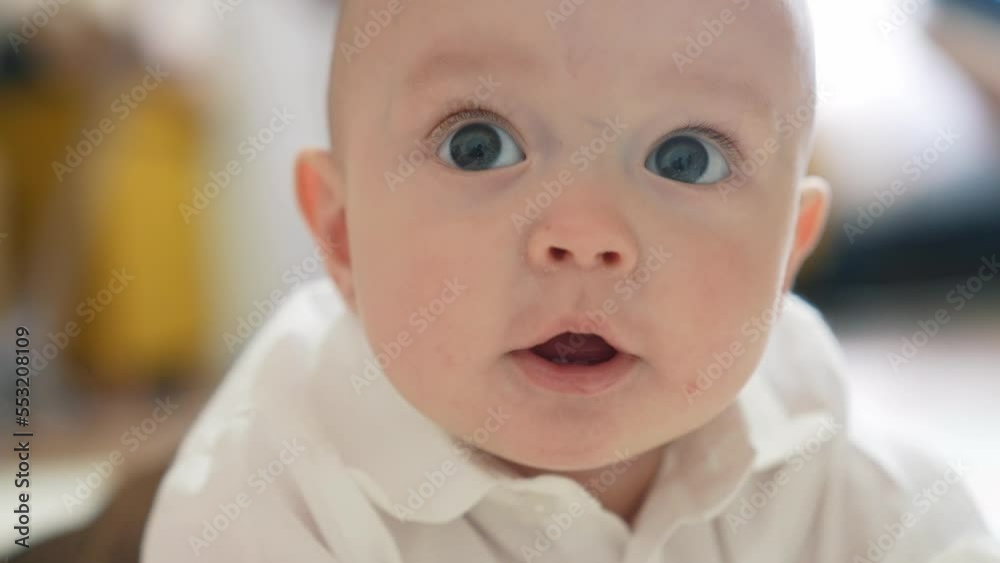 newborn baby a boy portrait close-up. little boy 6 months old looking at the camera 2 baby teeth are visible. happy family kid dream concept. boy smiling newborn lifestyle son newborn baby a boy portrait close-up. little boy 6 months old looking at the camera 2 baby teeth are visible. happy family kid dream concept. boy smiling newborn lifestyle son