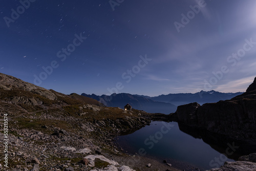 Full moon reflection in the alpine lake © Lukas