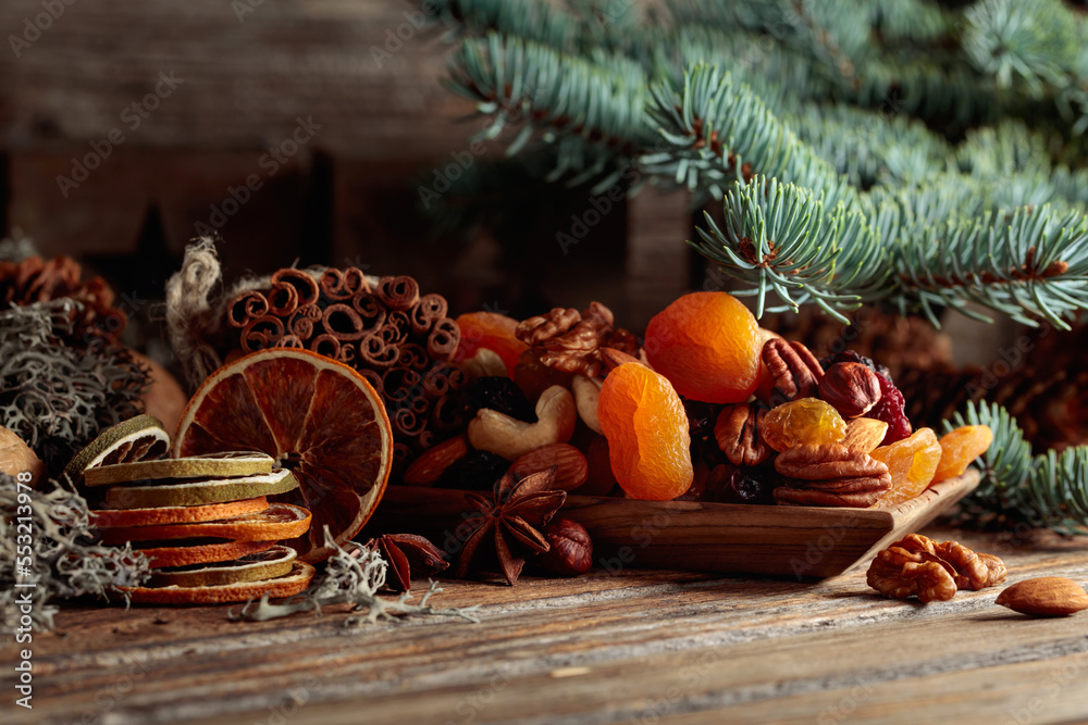 Christmas still-life with dried fruits and nuts. Christmas still-life with dried fruits and nuts.