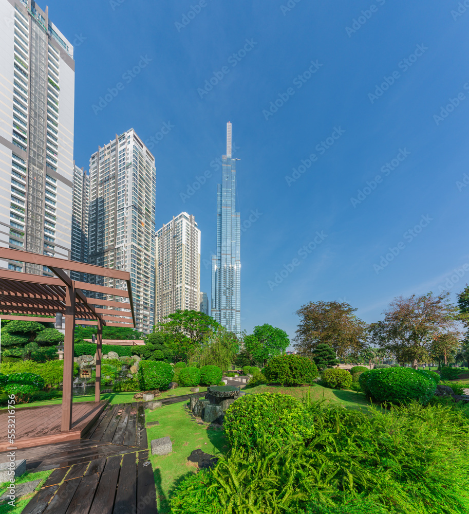 Landmark 81, skyscrapers viewed from below towards sky represents urban development with modern architecture. Combined with Vinhomes Central Park Project Landmark 81, skyscrapers viewed from below towards sky represents urban development with modern architecture. Combined with Vinhomes Central Park Project