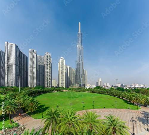 Landmark 81, skyscrapers viewed from below towards sky represents urban development with modern architecture. Combined with Vinhomes Central Park Project