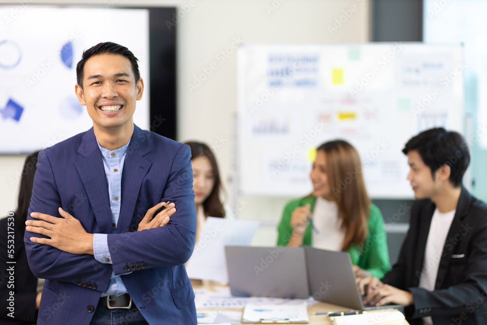Portrait of a business man or manager in an employee meeting room. Portrait of a business man or manager in an employee meeting room.