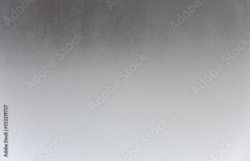 Steamy wet glass as texture or background. Humidity on window surface.