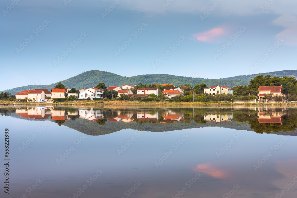 Reflection of village of Zablace near Sibenik, Croatia