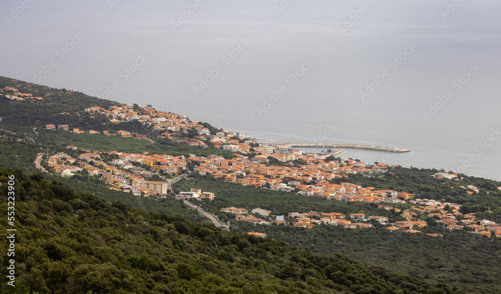 View of Small touristic town by the sea. Cala Gonone, Sardinia, Italy. View of Small touristic town by the sea. Cala Gonone, Sardinia, Italy.