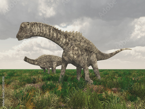 Dinosaurier Ampelosaurus in einer Graslandschaft © Michael Rosskothen