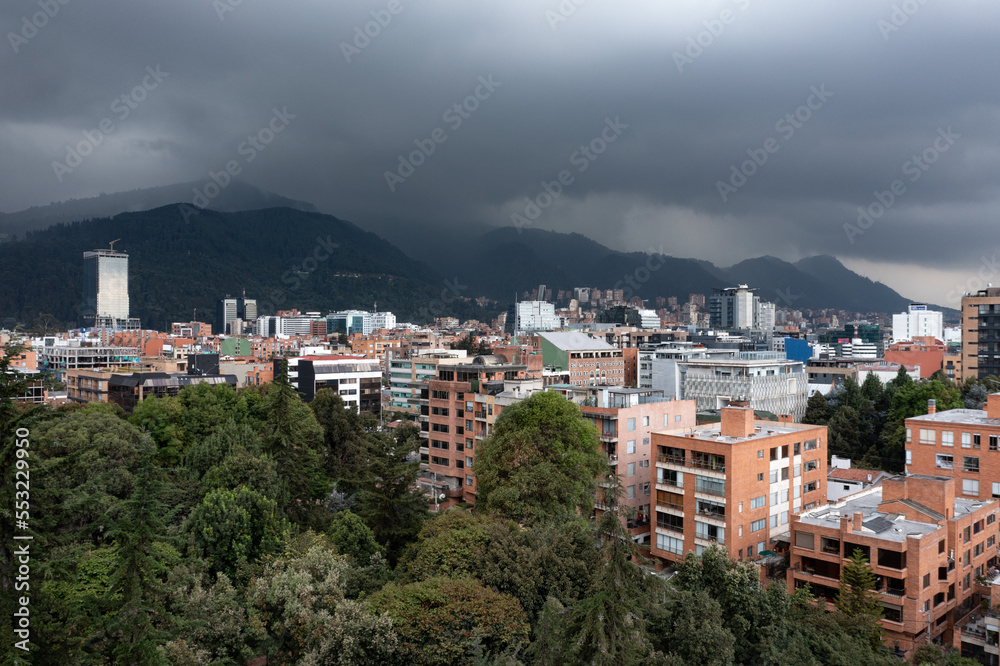 Aerial view of Bogota with dramatic stormclouds over the mountains