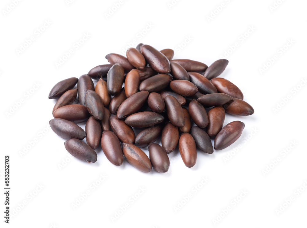 A group of baru nuts isolated over white background A group of baru nuts isolated over white background