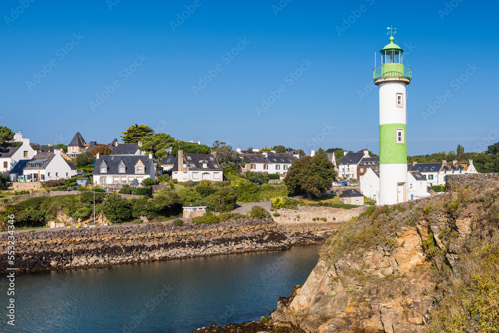 Scenic view of lighthouse in Clohars Carnoet in Brittany France during low tide