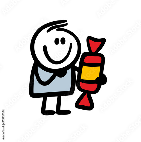 A little joyful boy received a huge candy as a gift.
