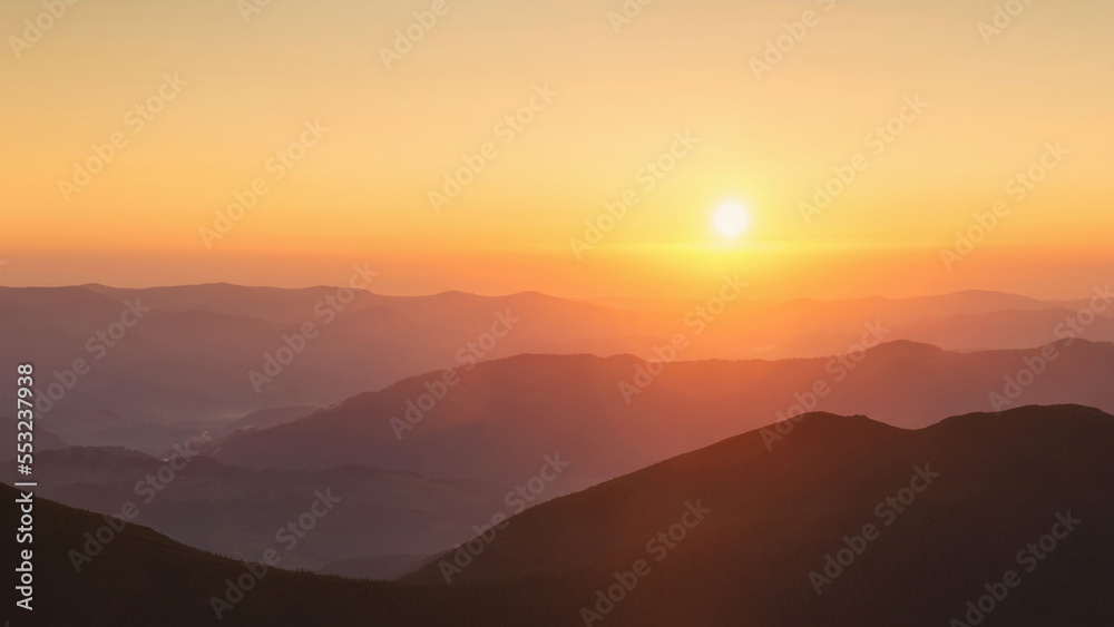 Beautiful panoramic mountain landscape on golden sunset