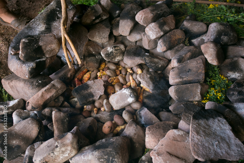 In the pachamanca ceremony, lamb, alpaca, pork and beef are cooked. Also variety of tubers and vegetables. All under hot stones and covered with earth.