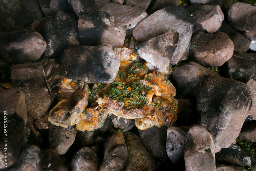 In the pachamanca ceremony, lamb, alpaca, pork and beef are cooked. Also variety of tubers and vegetables. All under hot stones and covered with earth. In the pachamanca ceremony, lamb, alpaca, pork and beef are cooked. Also variety of tubers and vegetables. All under hot stones and covered with earth.