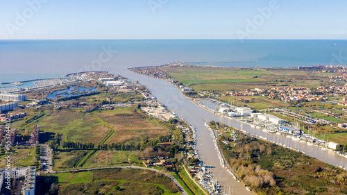 Aerial view of the Tiber River estuary in the Tyrrhenian Sea. It is located in the municipality of Fiumicino near Rome, Italy.