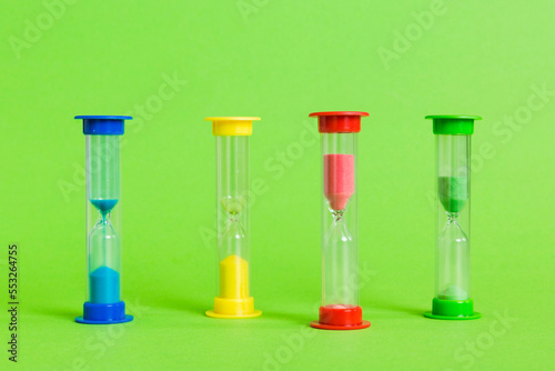 hourglass on the table, sand clock as time passing concept for business deadline, copy space