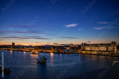 City of Oslo Norway in the Evening with Sunset, Sea, Historical buildings and Christmas decorations