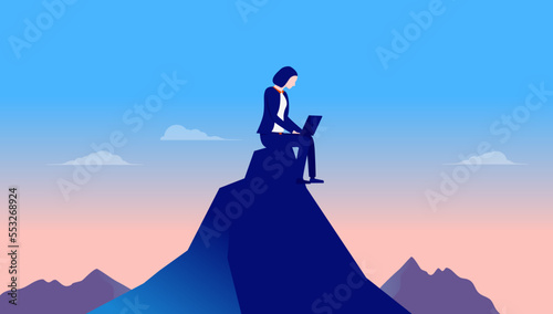 Work from anywhere - Woman sitting on mountaintop in nature landscape with laptop working remotely alone. Flat design vector illustration © Knut