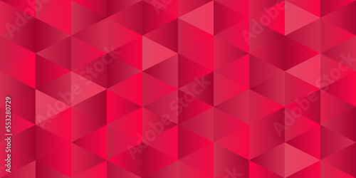 premium background of degraded triangles in pink, red and mangenta tones photo