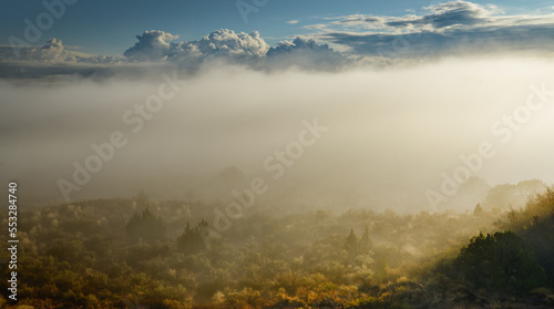 Moorning mists cloaking Arches National Park