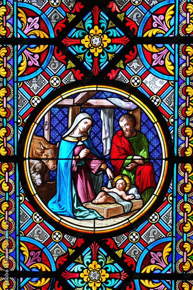 Nativity Scene. Stained glass window in the Cathedral. Basel, Switzerland - December 2022
