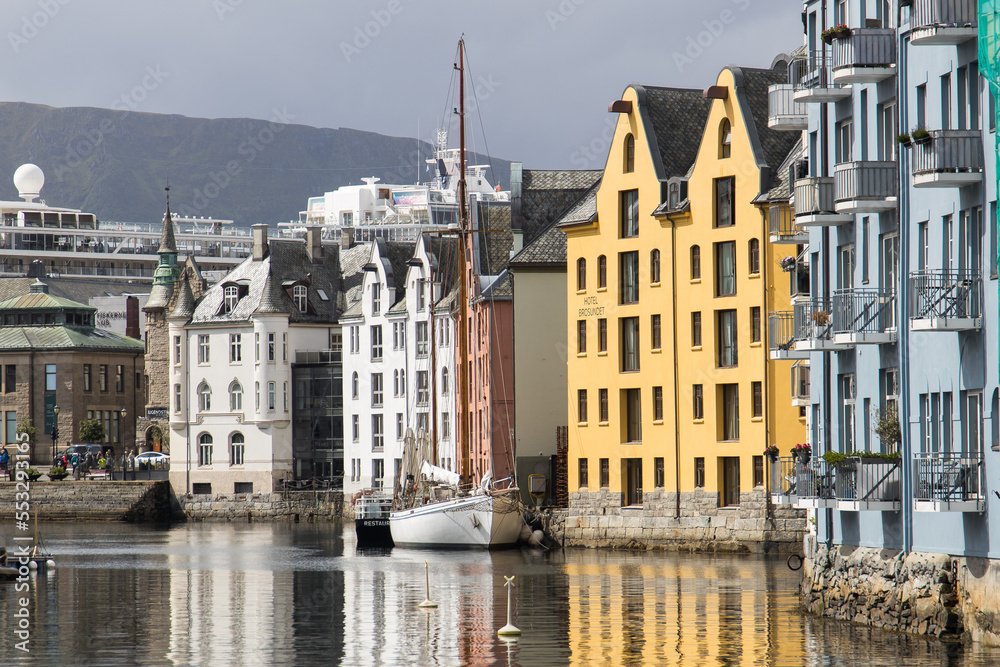 The city centre of Ålesund with colorful houses and a historic harbor