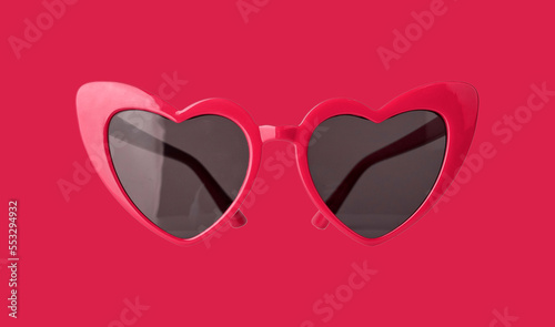 Heart shaped love sunglasses of trendy Viva Magenta color