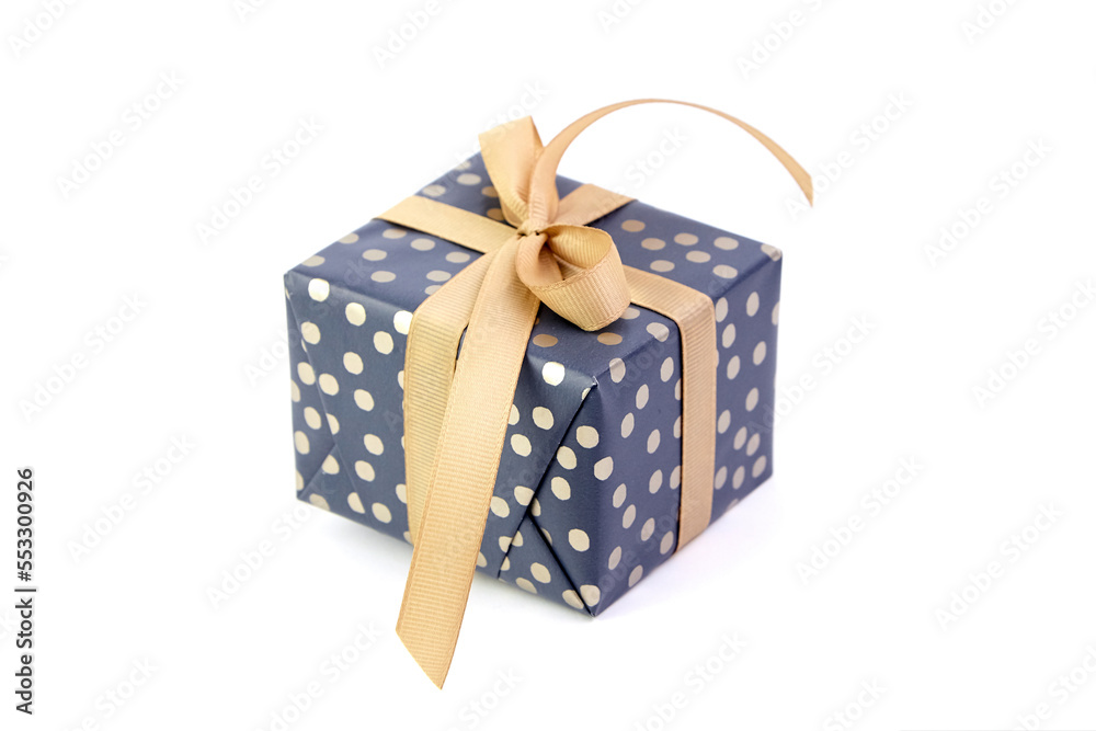 Gift box with bow isolated on white. Wrapped Christmas or birthday green color gift box. Single present