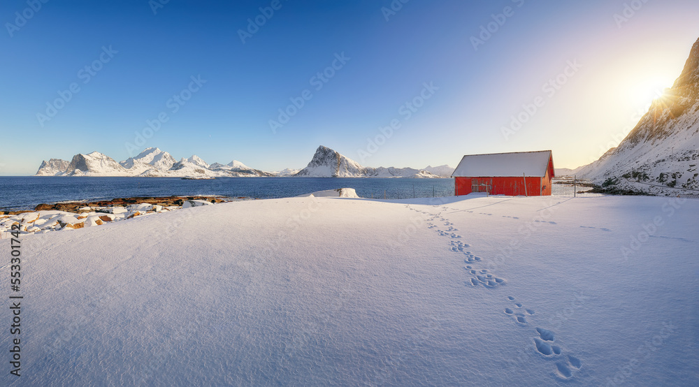 Stunning winter view on Vetvagoy coastline seen from Storsandnes beach in the morning. Stunning winter view on Vetvagoy coastline seen from Storsandnes beach in the morning.