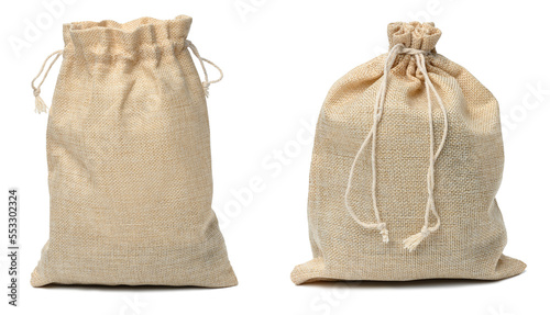 Full canvas bag tied with rope and isolated on a white background