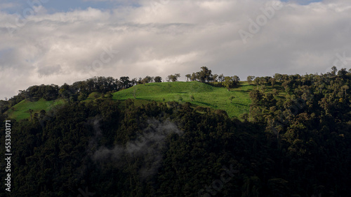 mountains and green hills with clouds in ecuador