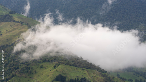 mountains and green hills with clouds in ecuador