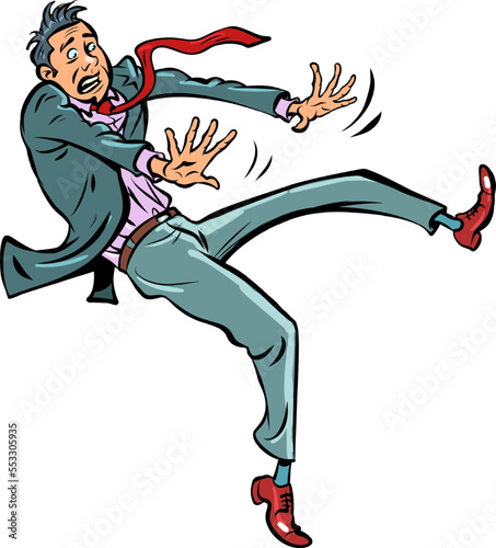 The man falls. The businessman barely stands on one leg. Inertia. slippery floor, disaster