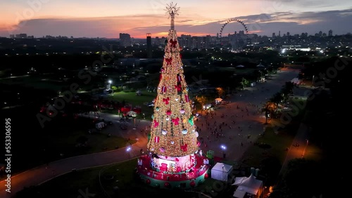 Christmas Tree at Sao Paulo Brazil. Sunset landscape of illuminated christmas Tree at Candido Portinari Park at Sao Paulo Brazil. Holidays scene. Illuminated Christmas Tree at Sao Paulo Brazil. photo