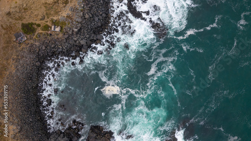 Aerial shot of the pacific ocean at Pichilemu, Chile