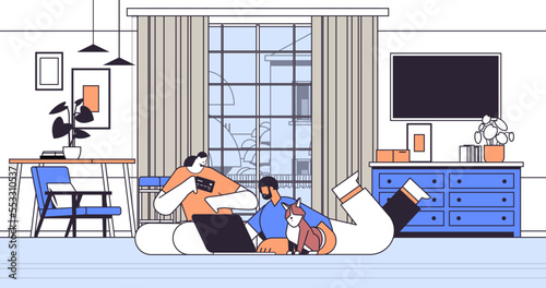 couple with credit card using laptop online shopping concept man woman ordering goods together living room interior