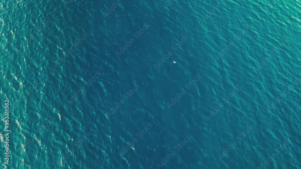 Ocean surface aerial view, sea water texture background top down view Ocean surface aerial view, sea water texture background top down view