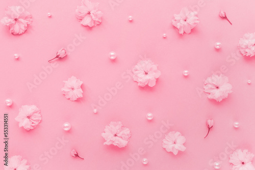Cherry blossom flowers and pearls in color of the year 2023 Viva