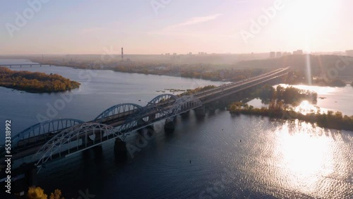 Wallpaper Mural Aerial view of long bridge over the river. Bright sunlight with reflection on the road. Torontodigital.ca