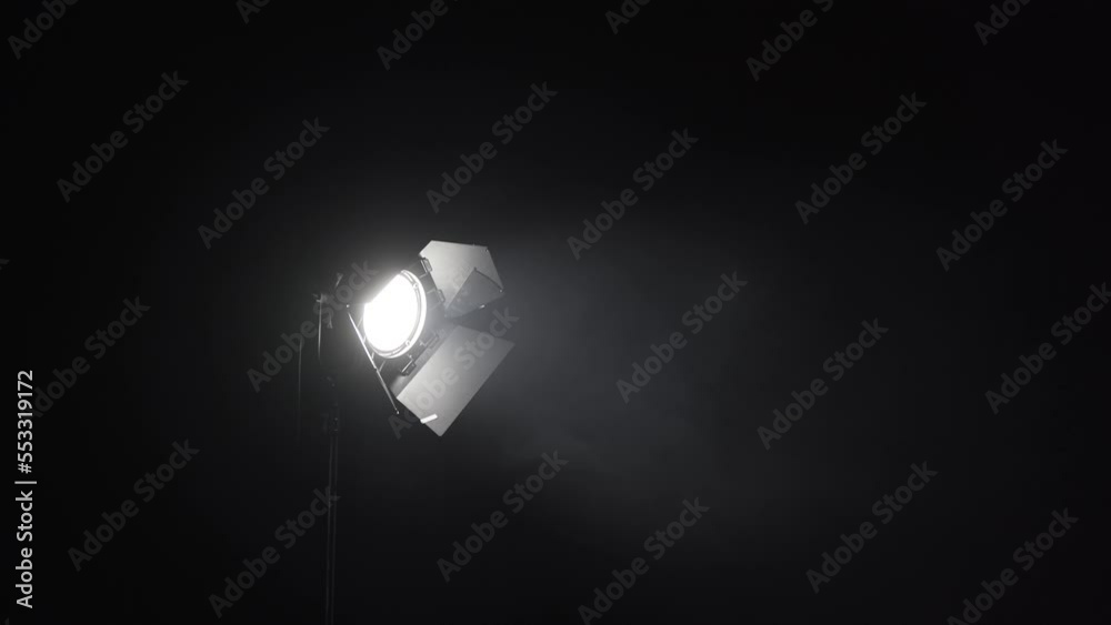Spotlight light for the stage. Shots of studio lighting. Lighting equipment. Lighting designer. Theatrical smoke. Art and creativity. 4K frames.