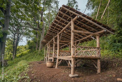 The traditional garden hut on the down hill area of East Java. The photo is suitable to use for hut garden background, environment poster and nature content.