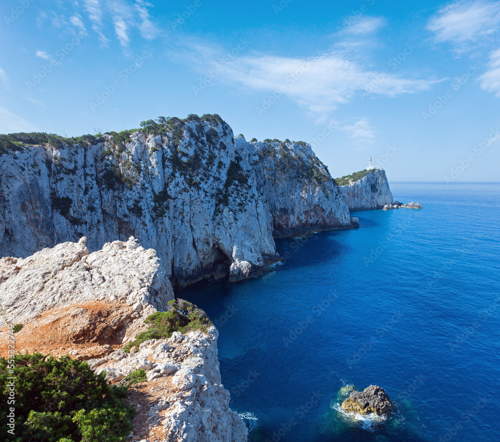 Fototapeta premium Rocky south cape of Lefkas island and lighthouse (Greece, Ionian Sea)