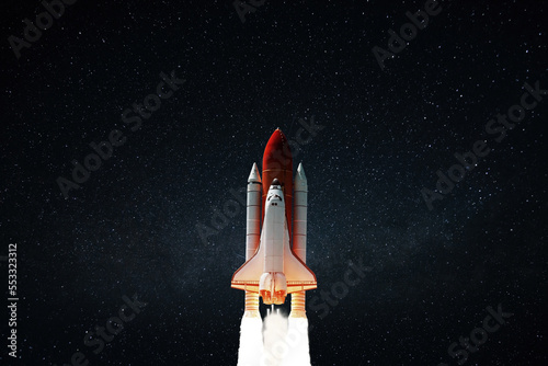 Fototapeta Naklejka Na Ścianę i Meble -  New space shuttle rocket with blast successfully takes off into the night starry sky. Spaceship launched into outer deep space with stars