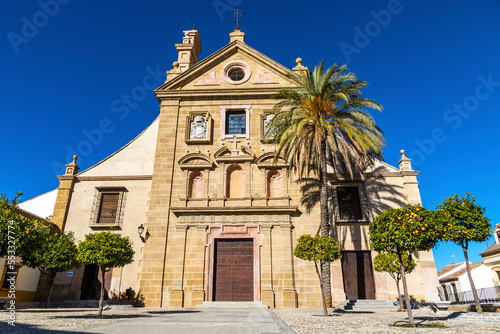 Church of the Holy Trinity (Spanish: Parroquia de La Santisima Trinidad Antequera) in Antequera city, Malaga, Spain. Facade view of the main buildig, which was built between 1672 and 1683