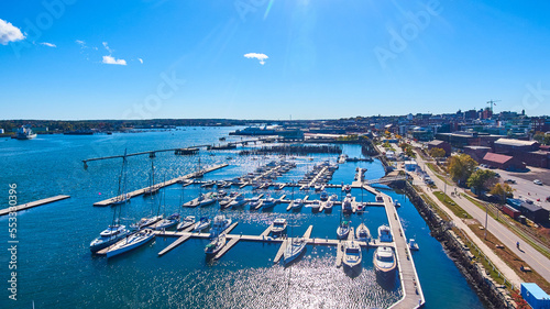 Aerial open view of port filled with boats on Maine coast in Portland